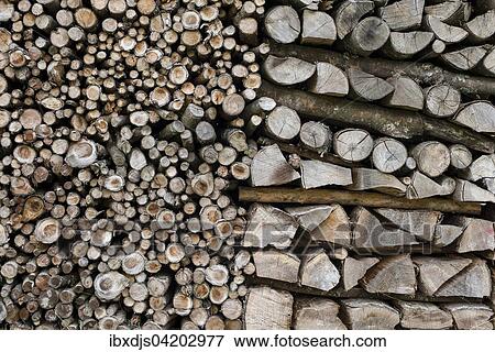 Stacked firewood View Large Photo Image Stock Photo - Stacked firewood. Fotosearch