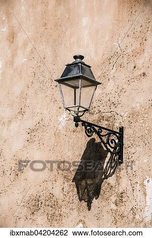 Street lamp on a brick wall, Bonifacio, Corsica, France, Europe View Large Photo Image Stock Image - Street lamp on a brick wall, Bonifacio, Corsica, France, Europe. Fotosearch