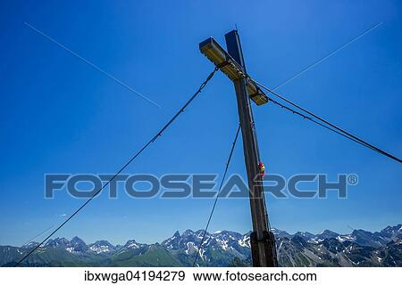 Stock Photo - Summit cross on the Fellhorn, 2038m, Allgau Alps, Bavaria, Germany, Europe. Fotosearch