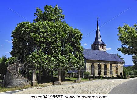 Tanzlinde and Peesten church, district of Kulmbach, Upper Franconia, Bavaria, Germany, Europe View Large Photo Image Stock Photo - Tanzlinde and Peesten church, district of Kulmbach, Upper Franconia, Bavaria, Germany, Europe. Fotosearch