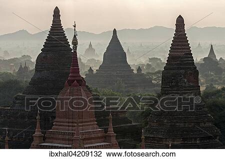 View of pagodas, temples, pagodas field, sunrise, morning light, Bagan, Mandalay region, Myanmar, Asia View Large Photo Image Stock Image - View of pagodas, temples, pagodas field, sunrise, morning light, Bagan, Mandalay region, Myanmar, Asia. Fotosearch