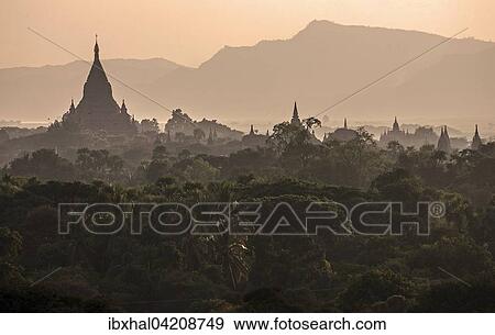 View of pagodas, temples, pagodas field, backlit, evening light, Bagan, Mandalay Division, Myanmar, Asia View Large Photo Image Stock Photo - View of pagodas, temples, pagodas field, backlit, evening light, Bagan, Mandalay Division, Myanmar, Asia. Fotosearch