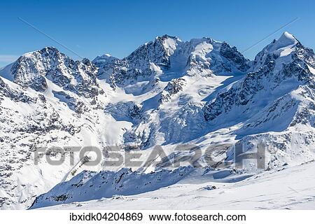 View of the Bernina Group, Piz Morteratsch on the left, Piz Bernina in the centre, Piz Scerscen on the right, Piz Roseg, Swiss Alps, Engadin, Canton of Graubunden, Switzerland, Europe View Large Photo Image Stock Photo - View of the Bernina Group, Piz Morteratsch on the left, Piz Bernina in the centre, Piz Scerscen on the right, Piz Roseg, Swiss Alps, Engadin, Canton of Graubunden, Switzerland, Europe. Fotosearch