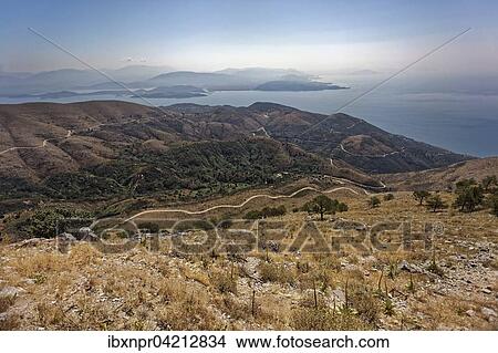 View of the island from the Mount Pantokrator, as far as Albania, Ionian Islands, Greece, Europe View Large Photo Image Picture - View of the island from the Mount Pantokrator, as far as Albania, Ionian Islands, Greece, Europe. Fotosearch