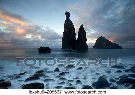 Volcanic rock formation Ilheus da Rib by the cliffs of Ribeira da Janela, Madeira, Portugal, Europe View Large Photo Image Stock Photo - Volcanic rock formation Ilheus da Rib by the cliffs of Ribeira da Janela, Madeira, Portugal, Europe. Fotosearch