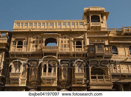 Windows and balconies, delicately decorated facade of Patwon Ki Haveli or Patwa ki Haveli, Jaisalmer, Rajasthan, India, Asia View Large Photo Image Stock Photo - Windows and balconies, delicately decorated facade of Patwon Ki Haveli or Patwa ki Haveli, Jaisalmer, Rajasthan, India, Asia. Fotosearch