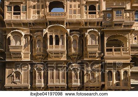 Windows and balconies, delicately decorated facade of Patwon Ki Haveli or Patwa ki Haveli, Jaisalmer, Rajasthan, India, Asia View Large Photo Image Stock Photo - Windows and balconies, delicately decorated facade of Patwon Ki Haveli or Patwa ki Haveli, Jaisalmer, Rajasthan, India, Asia. Fotosearch