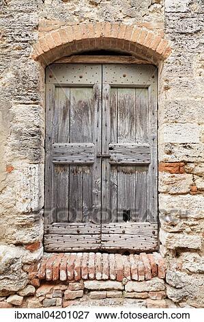 Wooden door, Lucignano d'Asso, Tuscany, Province of Siena, Italy, Europe View Large Photo Image Stock Photo - Wooden door, Lucignano d'Asso, Tuscany, Province of Siena, Italy, Europe. Fotosearch