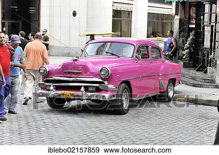 Stock Photo - 1950's vintage car parked at the Restaurant Floridita, town centre of Havana, Centro Habana, Cuba, Greater Antilles, Caribbean, Central America, America, North America. Fotosearch