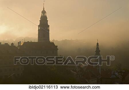 Č eský, Cesky Krumlov with the towers of the castle on the left and of St. Jost church on the right, in thick morning fog, Jihoč eský, Jihocesky kraj, South Bohemia, Czech Republic, Europe View Large Photo Image Stock Image - Č eský, Cesky Krumlov with the towers of the castle on the left and of St. Jost church on the right, in thick morning fog, Jihoč eský, Jihocesky kraj, South Bohemia, Czech Republic, Europe. Fotosearch
