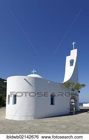 Stock Photograph - Agios Nicolaos or St. Nicholaos church at Potami beach at Karlovasi, Samos island, southern Sporades, Aegean sea, Greece, Europe. Fotosearch