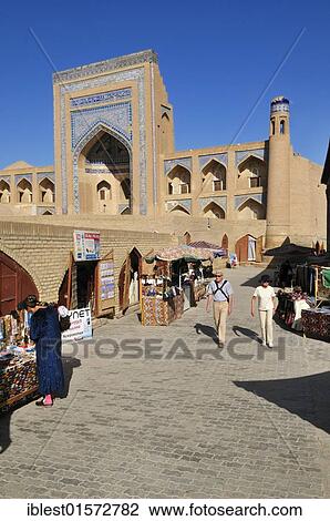 Allaquli Khan Madrassah, historic adobe town of Khiva, Chiva, Ichan Kala, Silk Road, Unesco World Heritage Site, Uzbekistan, Central Asia, Asia View Large Photo Image Stock Image - Allaquli Khan Madrassah, historic adobe town of Khiva, Chiva, Ichan Kala, Silk Road, Unesco World Heritage Site, Uzbekistan, Central Asia, Asia. Fotosearch