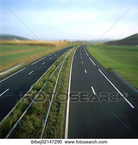 Stock Image - An empty highway, central France, Europe. Fotosearch