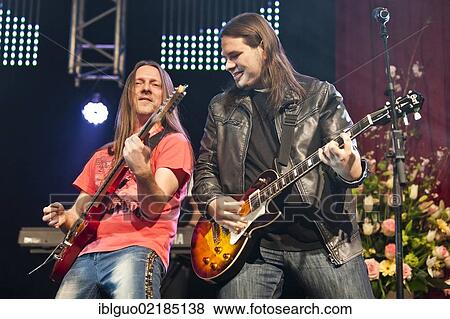 Stock Photo - Andreas Marberger and Georg Daviotis of the Austrian pop and folk music group "Schuerzenjaeger" performing live at the Schlager Nacht 2012, pop music event, in Lucerne, Switzerland, Europe. Fotosearch