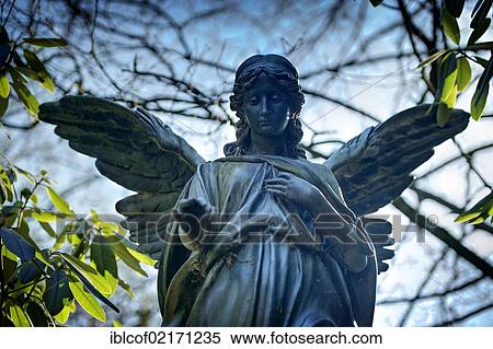 Angel statue at Ohlsdorf Cemetery in Hamburg, Germany, Europe View Large Photo Image Stock Photography - Angel statue at Ohlsdorf Cemetery in Hamburg, Germany, Europe. Fotosearch