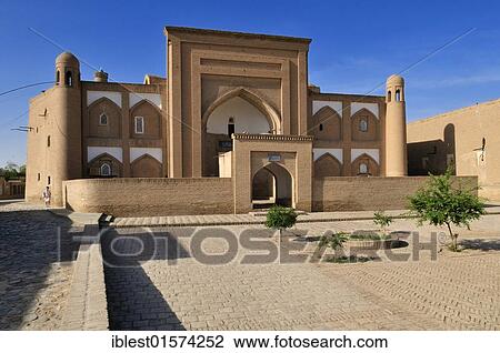 Stock Image - Arab Muhammad Khan Madrasah, historic adobe town of Khiva, Chiva, Ichan Kala, Unesco World Heritage Site, Uzbekistan, Central Asia, Asia. Fotosearch