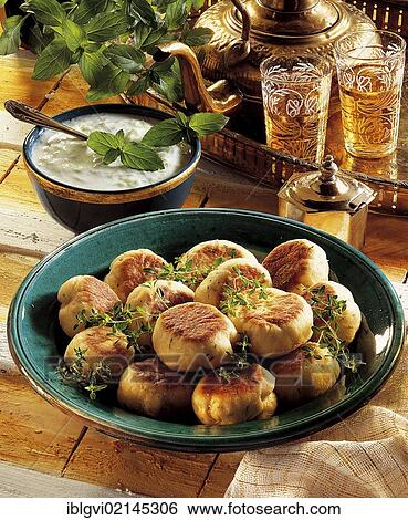 Stock Photograph - Arab thyme bread rolls, yeast dough, hot starter, Saudi Arabia, Asia. Fotosearch