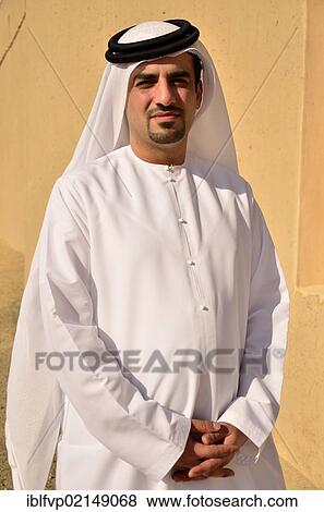 Arabian man wearing a typical dishdasha, white cape, Abu Dhabi, United Arab Emirates, Arabian Peninsula, Asia View Large Photo Image Stock Photo - Arabian man wearing a typical dishdasha, white cape, Abu Dhabi, United Arab Emirates, Arabian Peninsula, Asia. Fotosearch