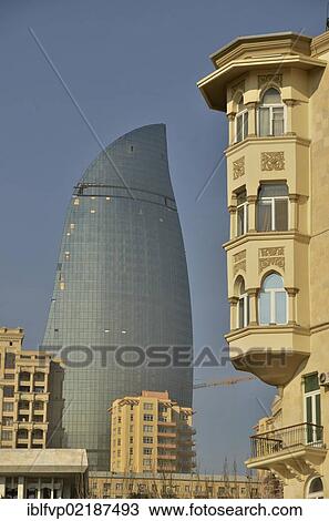 Art Nouveau facade at the beach promenade, Bulevar, in front of the facade of one of the high-rise towers of the three Flame Towers, the new landmark of the city, Baku, Azerbaijan, Caucasus, Middle East, Asia View Large Photo Image Stock Image - Art Nouveau facade at the beach promenade, Bulevar, in front of the facade of one of the high-rise towers of the three Flame Towers, the new landmark of the city, Baku, Azerbaijan, Caucasus, Middle East, Asia. Fotosearch