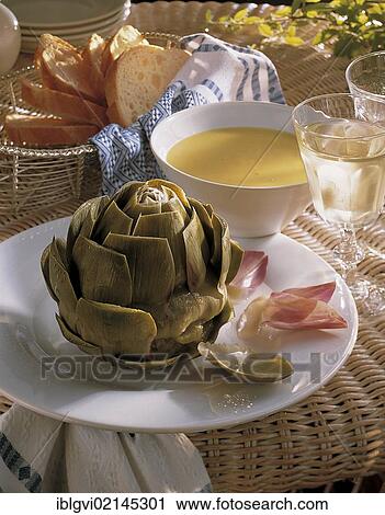Artichokes with garlic dip, hot starter, France, Europe View Large Photo Image Stock Image - Artichokes with garlic dip, hot starter, France, Europe. Fotosearch