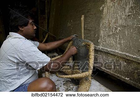 Artist making a statue for religious occasions, manufactory in Tollygunj, a suburb of Kolkata, West Bengal, India, Asia View Large Photo Image Stock Image - Artist making a statue for religious occasions, manufactory in Tollygunj, a suburb of Kolkata, West Bengal, India, Asia. Fotosearch