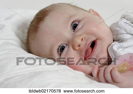 Stock Photo - Baby, 6 month, smiling. Fotosearch