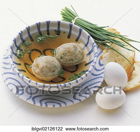 Stock Image - Bacon dumpling soup from Tyrol, Austria, Europe. Fotosearch
