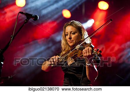 Stock Image - Barbara Wildberger accompanying the Swiss musician Reto Burrell, performing live in the Schueuer concert hall, Lucerne, Switzerland, Europe. Fotosearch