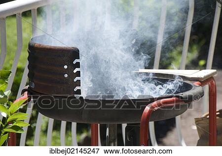Stock Photo - Barbecue, burning charcoal. Fotosearch