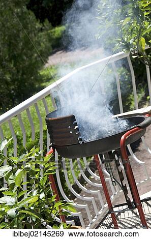 Stock Photo - Barbecue, burning charcoal. Fotosearch