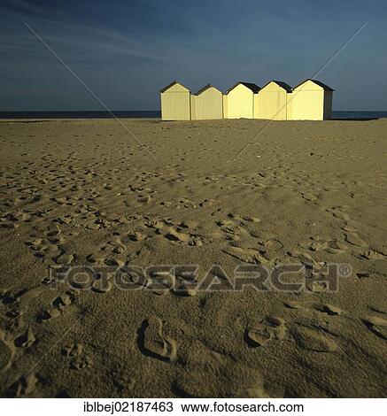 Beach huts under a stormy sky in Normandy, France, Europe View Large Photo Image Stock Image - Beach huts under a stormy sky in Normandy, France, Europe. Fotosearch