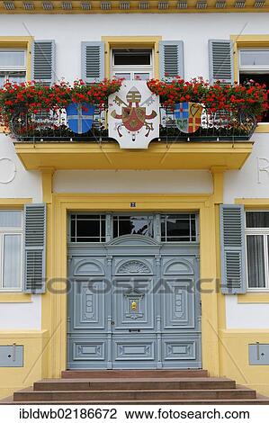 Stock Image - Bishops house, coat of arms of the diocese of Speyer, the Vatican, Speyer, Rhineland-Palatinate, Germany, Europe. Fotosearch