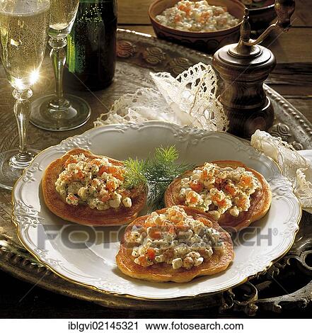 Blins with cream cheese, salmon and cucumber, hot starter, Russia, Europe View Large Photo Image Stock Image - Blins with cream cheese, salmon and cucumber, hot starter, Russia, Europe. Fotosearch