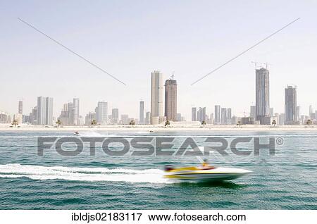 Boat in front of the skyline of Dubai, United Arab Emirates, Middle East, Asia View Large Photo Image Stock Photo - Boat in front of the skyline of Dubai, United Arab Emirates, Middle East, Asia. Fotosearch
