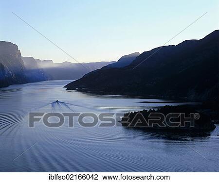 Boat on Lysefjorden, Lysefjord at dawn, Rogaland, Norway, Scandinavia, Europe View Large Photo Image Stock Image - Boat on Lysefjorden, Lysefjord at dawn, Rogaland, Norway, Scandinavia, Europe. Fotosearch