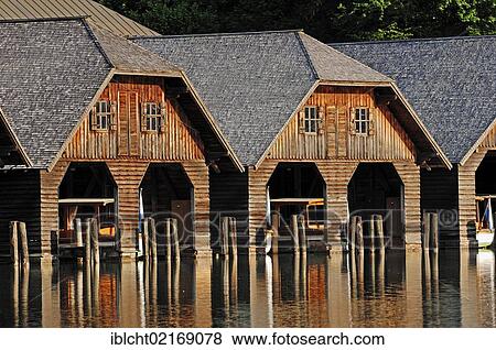 Stock Photo - Boathouses in Schoenau on Koenigssee lake, Berchtesgadener Land, Bavaria, Germany, Europe, PublicGround, Europe. Fotosearch