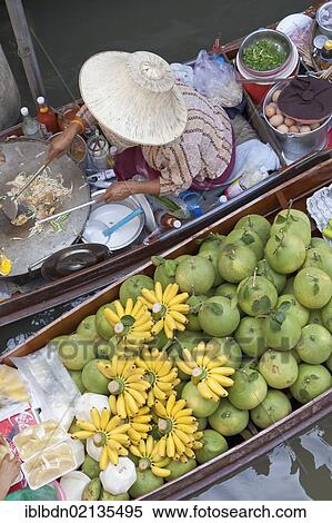 Stock Photography - Boats at the Damnoen Saduak floating market near Bangkok, Thailand, Asia. Fotosearch
