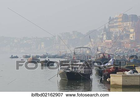 Boats on the holy river Ganges, Varanasi, Uttar Pradesh, India, Asia View Large Photo Image Stock Photo - Boats on the holy river Ganges, Varanasi, Uttar Pradesh, India, Asia. Fotosearch