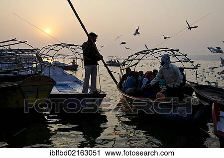 Boats with pilgrims at Sangam, the confluence of the holy rivers Ganges, Yamuna and Saraswati, in Allahabad, Uttar Pradesh, India, Asia View Large Photo Image Stock Image - Boats with pilgrims at Sangam, the confluence of the holy rivers Ganges, Yamuna and Saraswati, in Allahabad, Uttar Pradesh, India, Asia. Fotosearch