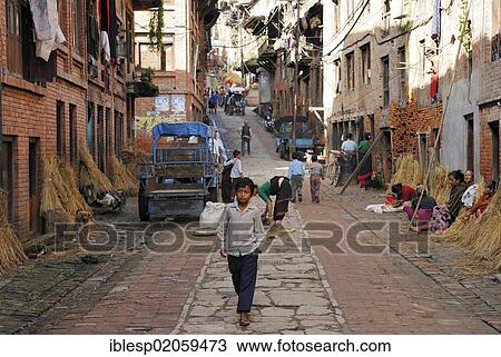 Boy on historic street, Bhaktapur, Kathmandu Valley, Nepal, Asia View Large Photo Image Stock Image - Boy on historic street, Bhaktapur, Kathmandu Valley, Nepal, Asia. Fotosearch