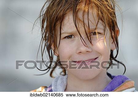 Boy with wet hair after swimming, smiling View Large Photo Image Stock Photography - Boy with wet hair after swimming, smiling. Fotosearch