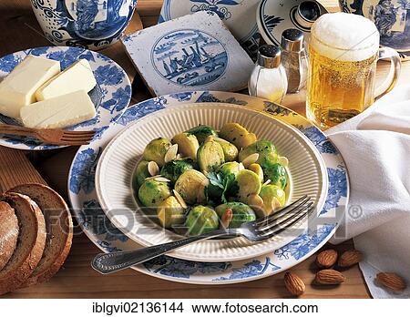 Brussels sprouts in almond butter with vegetables, Belgium, Europe View Large Photo Image Picture - Brussels sprouts in almond butter with vegetables, Belgium, Europe. Fotosearch