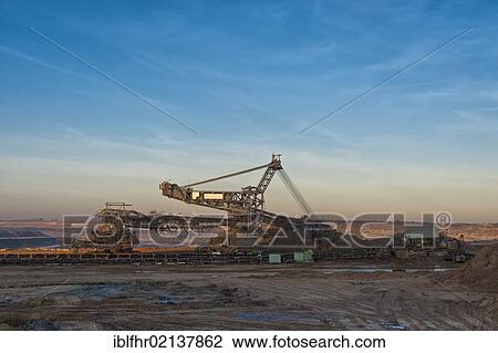 Bucket-wheel excavator at the edge of the Garzweiler pit on a winter morning, Grevenbroich, North Rhine-Westphalia, Germany, Europe, Germany, Europe View Large Photo Image Stock Image - Bucket-wheel excavator at the edge of the Garzweiler pit on a winter morning, Grevenbroich, North Rhine-Westphalia, Germany, Europe, Germany, Europe. Fotosearch