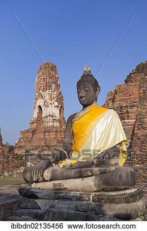 Buddha statue amid the ruins of Wat Phra Mahathat, Ayutthaya, Thailand, Asia View Large Photo Image Stock Photograph - Buddha statue amid the ruins of Wat Phra Mahathat, Ayutthaya, Thailand, Asia. Fotosearch