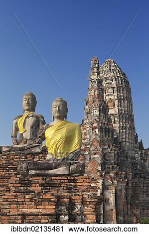 Stock Image - Buddha statues at Wat Chaiwatthanaram, Ayutthaya, Thailand, Asia. Fotosearch