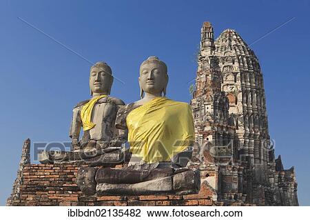 Stock Image - Buddha statues at Wat Chaiwatthanaram, Ayutthaya, Thailand, Asia. Fotosearch