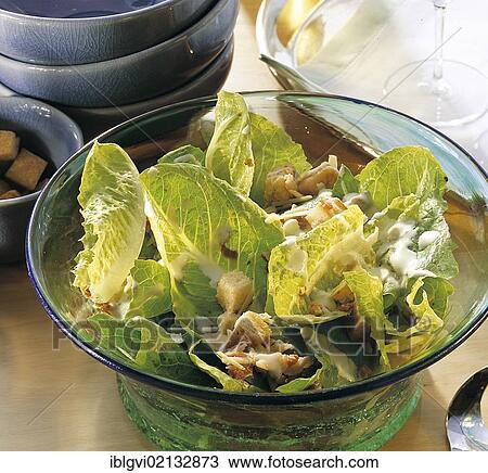 Stock Image - Caeser's salad, romaine lettuce, anchovies and croutons, USA, North America. Fotosearch