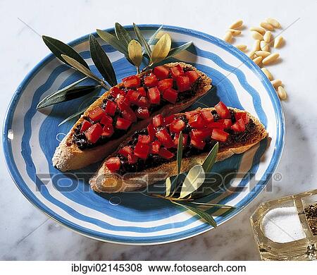 Stock Photo - Calabrian olive crostini with olive cream, hot starter, Italy, Europe. Fotosearch