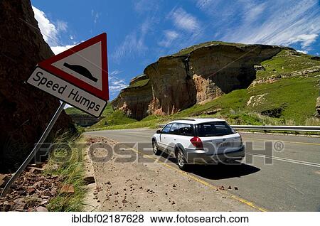 Car on a road, caution sign, speed humps, Mushroom Rock, Golden Gate National Park, Free State, South Africa, Africa View Large Photo Image Stock Photo - Car on a road, caution sign, speed humps, Mushroom Rock, Golden Gate National Park, Free State, South Africa, Africa. Fotosearch