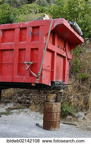 Carelessly parked and supported truck trailer, Samos Island, Aegean Sea, southern Sporades islands, Greece, Europe View Large Photo Image Stock Photo - Carelessly parked and supported truck trailer, Samos Island, Aegean Sea, southern Sporades islands, Greece, Europe. Fotosearch